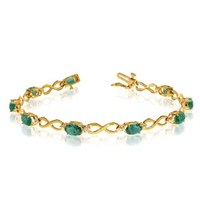 10K Yellow Gold Oval Emerald Stones And Diamonds Infinity Tennis Bracelet, 7"